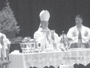 The Most Reverend Paul David Sirba, Ninth Bishop of the Diocese of Duluth, prepares for the Liturgy of the Eucharist at his Ordination on Monday, December 14, 2009.