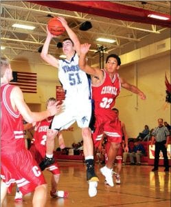 Photos by John Grones, courtesy of Polarleague.com The Vikings faced off against the Cromwell Cardinals on Friday, December 18. Here, Mike Austin grabs a rebound at the game versus Cromwell. Austin led the Vikings with 14 points.