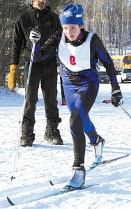 The Viking Nordic skiers fared well on the manmade snow at Mt. Itasca in Coleraine, MN. Left: Audrey Summers wowed the crowd with a decisive first-place finish in the junior high 3k race. Below left: Ben Seaton was the third-place finisher in the junior high boys' race. Below right: Following Ben with a seventh-place finish was Joe Rauzi.