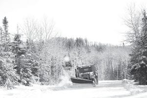 File photo/Rhonda Silence Cook County snowplows were taxed by the heavy, wet, snow of the Christmas 2009 storm.