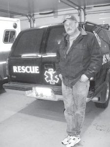 Staff photo/Jane Howard Tofte Fire Chief Rich Nelson standing in front of one of the rescue squad’s vehicles. He gave a tour of the fire hall Monday, January 11, 2010 before a meeting of Schroeder and Tofte town representatives to discuss the cost of shared First Responder services. Nelson, CCHS class of 1981, has been volunteering for the department since he was a teenager and has a 17-year-old son signed up for upcoming firefighter training. He helped construct this building when he was in eighth grade. He pointed out the department’s 5,000-gallon tanker, made by local volunteers. It combined a refurbished logging truck, a fuel tank previously used for a jet engine, and a tank welded together onsite that holds three times the amount of water regular tankers can hold. Nelson also pointed out the department’s ladder truck, the only one on the North Shore outside of Duluth.