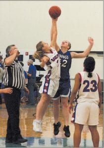 Staff photos/Laurie Johnson The Vikings had three wins in a row last week, defeating Moose Lake, Albrook and Carlton. Left: Senior Essa Jacobsen got the action going at the tip-off versus Carlton on Friday, January 8. The Vikings defeated the Carlton Bulldogs, 76-35.