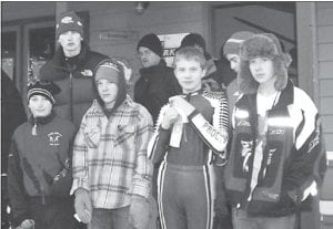 Photo by Kelly Rauzi The winning junior high cross-country ski team at Korkki Nordic Ski Area: (L-R, front) Joe Rauzi, Lino Rauzi, a Proctor skier, and Nate Carlson. Back in blue cap: Hank Bemlott.