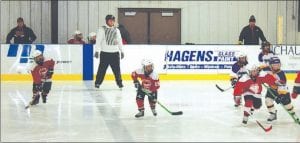 Photo courtesy of the team M-2 hockey action at the Carlton Tournament last weekend. The M-2s had the exciting experience of playing on UMD Bulldog ice at the DECC in Duluth. If you would like to see the M-2s in action, stop by the skating rink at the Cook County Community Center on Monday, Tuesday or Thursday between 4:30 and 6:30 p.m.