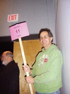 Bill Hansen holding up a sign for the Tofte precinct at the Cook County DFL caucus February 2 at the Arrowhead Center for the Arts.