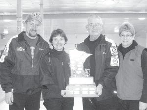 Two Harbors curling members Ron Gervais of Tofte and Norma O’Leary of Silver Bay paired with Dave Running and Pam Cavers from the Duluth Curling Club to win the 2010 Minnesota State Mixed Curling Championships January 30 -31 at the St. Paul Curling Club. The team will now represent Minnesota at the USCA National Mixed Curling Championships in Chicago, Il March 20 - 27, 2010. (L-R) Dave Running, Norma O’Leary, Ron Gervais (skip), Pam Cavers.