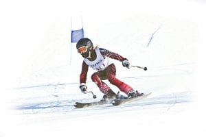 Race No. 4 for the Northland Junior Race Series was held on “home hill” and the Lutsen Mountains Junior Ski Team showed their talents. Nine-year-old Reilly Wahlers charges toward a first place finish.