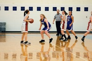 Bekah Laky on defense against Ely on Saturday, February 6. The Vikings defeated the Timberwolves, 74-40.