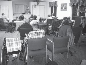 Outgoing Cook County Republican Party Chair Mark Delamater leads the county convention at the Senior Center in Grand Marais Tuesday, February 16, 2010.