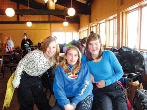 J ust like the Ol ympian s, th e North land Junior Race Series par ticipants     fa ce d fast a nd icy cou rses at Spi rit Mo untain this week. (L-R) Haley Lau ren Thompson and Ava Mc Milla n re laxing after the race.