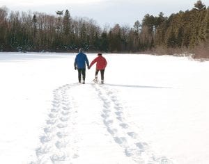 The weather and conditions were great for snowshoeing last weekend! Mike and Jan Nelson of Minneapolis enjoyed a day in the powder on Spen Lake near Hungry Jack Lake.