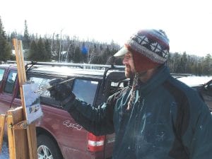 Scott Lloyd Anderson of Minneapolis was one of the artists who participated in the Grand Marais Art Colony Winter Plein Air event. Anderson set up on Gunflint Lake and painted the folks at the Cook County Ridge Riders Trout Derby around the bonfire. Anderson’s work, along with that of the other Plein Air participants, will be on display at the Grand Marais Art Colony until the end of March.