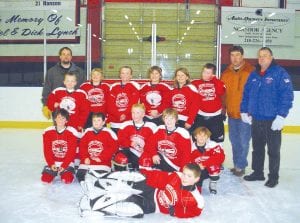 The Cook County Mites 2s were victorious in the Silver Bay Jamboree! Front: Chase Gwash. (L-R, front row) Will Ramberg, Trevor Berglund, Connor Somnis, Cameron Roy, Levi Sheils. (L-R, back) Coach Paul Sporn, Andrew Miller, Ethan Sporn, Tristen Bockovich, Josh Prom, Alyssa Lashinski, Jayden Grivette, Coach Mike Prom and Coach Steve DuChien.