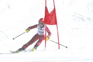 First year racer Jack Viren powers past a gate.