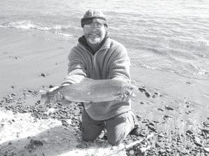 Bruce Zimpel caught this 7-pound rainbow trout on March 1 while shore fishing on Lake Superior’s North Shore.