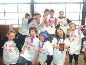 The Math Masters celebrate their excellent performance by being silly! (L-R) Madison Roy, Will Seaton, Frankie Miller, Anika Schwarz, Sam Kern. (L-R, back) Pete Summers, Joe Rauzi, Ben Resek, Sean MacDonell, Shauna Blake.