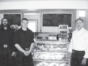 Above: Allen Campbell’s patrons will be greeted by staff wearing kilts. Here (L-R), Lance Brown, Geoff Parsons, and owner Dave Parsons stand beside some of the restaurant’s lunch and coffee time offerings. The eatery will be open 7 a.m. to 11 p.m. Fridays through Sundays starting April 15 and 7 a.m. to 11 p.m. seven days a week starting May 1.