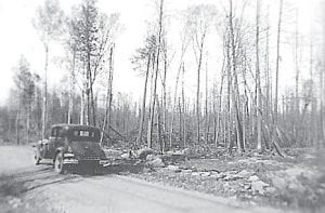 Fires have always been a concern for the North Shore. This picture from Joe Spitznagle’s photo records of his days with the Civilian Conservation Corps (CCC) in Hovland shows the Arrowhead Trail—the McFarland Road at that time—in 1936. The photo is annotated “after the fire.”