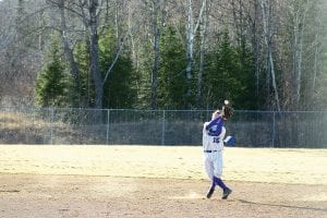 In the first home game of the season, the Vikings defeated the Mariners, 7-6. Senior Jacob Rude loses his cap on a catch!