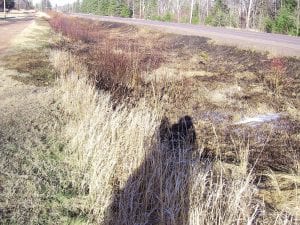 Lutsen firefighters extinguished a grass fire on the upper side of Highway 61 on April 15 before it could set the woods on fire. Fortunately, the fire was contained in the ditch between the highway and the dirt access road that runs adjacent to the highway in Lutsen.