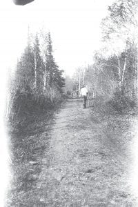 The Cook County News-Herald has probably received more reader feedback about the old photos of the Gunflint Trail than any other Historical Reflection offering. So we thought we’d share this photo from the Cook County Historical Society collection of Highway 61—before it was a highway!