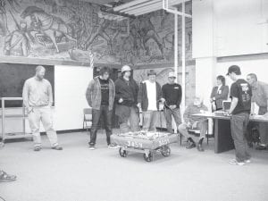 The Cook County High School robotics team demonstrated their robot to the school board Wednesday, April 21, 2010. The team came in 43rd out of 67 teams at the state competition April 1-2. (L-R), Industrial Arts teacher/competition advisor Eli Hill, Max Simonowicz, Alton Danielson, Alex Ditmanson, mentor Tim Johnson, school board member Leonard Sobanja, Principal Gwen Carman, Karl Ingebrigtsen, school board member Eric Kemp.