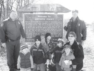 Taking part in the Earth Day cleanup at Artists' Point in Grand Marais were community members from many walks of life, including the US Border Patrol, the US Forest Service, local businesses and this group of children from the North Shore Children’s House preschool. (L-R) Rich Fortunato, Border Patrol, Andrew Hallberg, Finn Furcht, Taylor Everson, Recko Ahonen, Elias Sobanja, Maggie Smith, Cheryl Hovde, and Steve Robertson, US Forest Service.