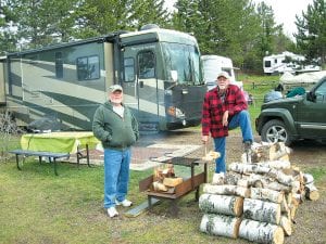 Fire restrictions are in place due to unusually dry conditions this spring, however recent rainy days have allowed the ban to be relaxed in some areas. Campfires are now allowed in fire rings associated with a home or resort. At the Grand Marais Municipal Campground, Ron Vance of Fort Meyers, FL and Larry Waalken of Forest Lake MN are taking advantage of the lifting of the ban.