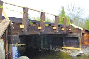 Bridge repairs in progress on Pine River Bridge at McFarland Lake.