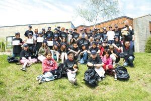 After the 2010 Cook County D.A.R.E. graduation on Friday, May 21, students gathered outside for a traditional photo to show off their D.A.R.E. caps and T-shirts. D.A.R.E. stands for drug abuse resistance education. Students completed 17 weeks of coursework to learn how to avoid drug and alcohol use and violence.