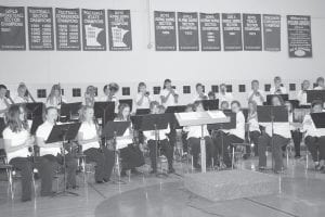 Above: The Junior High Band was in fine form at the CCHS spring band concert held Wednesday, May 19. Right: Bill Tormondsen thanks the audience at the Spring Band concert.