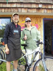 Left: Mark Spinler presented Leah Thomas with this sporty new bicycle given away in a drawing at the conclusion of “Get Active Week.” About 250 people from the community took part in the events that featured exercise like walking, running and bicycling as a way to get fitter and reduce stress.