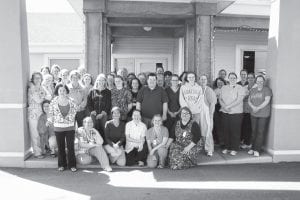 Staff from North Shore Hospital & Care Center celebrated National Hospital & Nursing Home Week May 9-15, gathering in front of the Care Center for a photo of staff from a number of departments—all working to fulfill the American Health Care Association theme, “Enriching Every Day.”