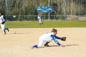 The Viking softball season came to an end last week with a loss to the Carlton Bulldogs in Carlton. Above: Senior Samantha Jacobsen dives to get an out. Above right: Ninth-grader Sarissa Falk catches a grounder. Right: Ninth-grader Bailey Morrison throws to home at a home game earlier this season.