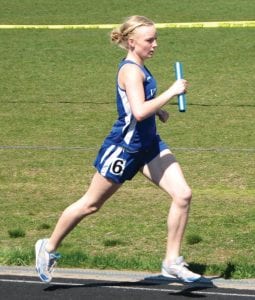 Left: Ailee Larson was part of the 4x800 relay team, but her best race was in the 800 (half-mile), which she finished in 2:26:9. Above: Kieran Scannell tries to stay with the leader in the two-mile race.