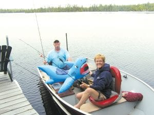 Fishing is serious business—or not? Andy Brostrom of Grand Marais/ Twin Cities and Gail Englund of Grand Marais didn’t catch any walleye in Tom Lake but landed this unusual specimen over Memorial Day weekend.