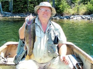 Vince Ekroot of Little Vince’s Fishing Guide Service shows off another beautiful rainbow trout. Caught where? Vince won’t tell us.