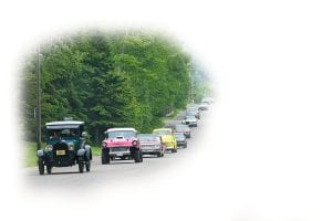 Traffic stopped as the participants in the 2010 Classic Car Show paraded through Grand Marais to Harbor Light Supper Club, where classic car aficionados enjoyed dinner and exchanged car stories.