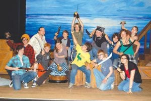 Pirates return to the Grand Marais Playhouse stage June 24-27 and July 1-4 in the swash-buckling adventure Treasure Island. Pictured are Sarah O’Phelan, Will Brandenburg, Kevin Kager, Colton Thompson, Stage Combat Instructor Annie Enneking, Sean MacDonell, Cy Fortunato, Will Seaton, Jackson Nickolay, Jordyn Kirk, Yvonne Block, Sarah Larsen, Michaela Peterson, and Maria Nickolay.