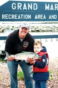 Scott Sandbo and his son Everett of the Twin Cities show off the Chinook salmon they caught on a charter with Captain David Williams of Fishin’ Chics & Dad Charters of Grand Marais. Scott and Everett are the son and grandson of Mark and Jeanne Sandbo of Grand Marais.