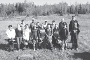 Eleven youths, ages 12 – 15 years, completed Minnesota Department of Natural Resources (DNR) all-terrain vehicle safety training on May 22, 2010. For a change, the weather was nice at the old airfield on Devil Track Lake. (L-R, front) Trace McQuatters, Larissa Goettl, Andrew Lashinski, Rory Bakke, Jack Wieben, Frankie Miller, Leo Johnson, Jaret Baker, Kyler Johnson. (L-R, back) CO Tom Wahlstrom, Eric Nelms, Hayden Goettl, Charles Silence, CO Mary Manning, Gideon Silence, CO Darin Fagerman. (Not pictured Cassidy Gecas, instructor Steve Lashinski).