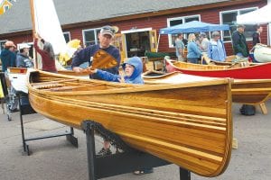 The 13th annual Wooden Boat Show at North House Folk School in Grand Marais brought out large crowds Friday – Sunday, June 18 – 20. There were many families enjoying the masterfully crafted wooden boats on display.