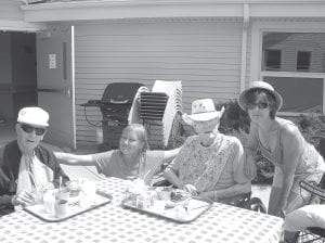 The North Shore Care Center has been a picnicking place in recent weeks! Gerry Eisler’s daughters were in Grand Marais to enjoy fishcake picnic with their dad on the patio on June 21. (L-R) Byron Whaley, Sharon Pointer, Gerry Eisler, and Pam Cathcart.