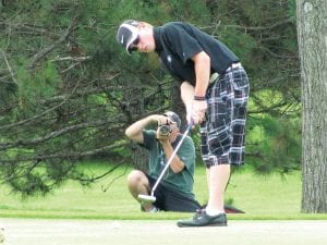 Zack Twiest studiously follows the ball as it winds its way toward the hole. Twiest, a junior, is only the third golfer from Cook County High School to qualify for the state high school golf tournament. This year’s two-day meet was held at Pebble Creek golf course in Becker, MN.