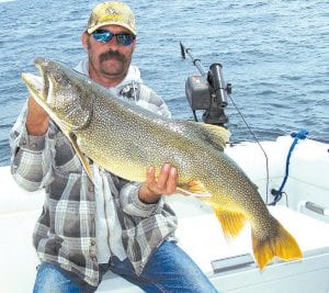 Captain Darren Peck of Tofte Charters shared this nice picture of a fellow from Grand Rapids named Forrest, who caught this 19.1- pound lake trout that was 37 inches long. The fish, caught on June 26, was released.