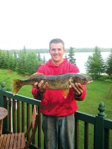 Greg Gresczyk of Grand Marais caught this 27.5 inch 7-pound walleye on June 23 on Devil Track Lake. Gresczyk was fishing with the Devil Track Wednesday night fishing league.