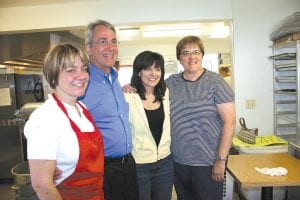 Candidate for Lieutenant Governor John Gunyou stopped to check out the newly expanded kitchen at World’s Best Donuts on Wednesday, June 30. The visit was part of Gunyou’s “Main Street Tour.” (L-R) Donut Shop co-owner Stacy Hawkins, John Gunyou, Donut Shop co-owner Dee Brazell, and Grand Marais Mayor Sue Hakes.