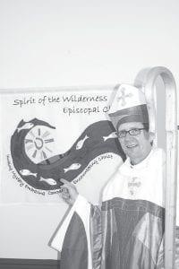 Bishop Brian Prior, head of the Episcopal Church in Minnesota, officiated at the first official service of Spirit of the Wilderness Episcopal Church in its new role as a mission of the larger Episcopal Church. His vestments had been made for him to symbolize elements of both Christianity and Minnesota.