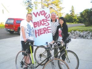 The Workers on Wheels (WOW) project hopes to provide bicycles for use by international workers in our community. Taking advantage of the program is Ercument Guney from Turkey and Hong Bui from Viet Nam. They were delighted to pick up their loaner bikes from WOW Representative Dan Strayer.