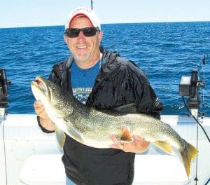 Gordy Salisbury of Burnsville, MN, caught and released this 24-pound lake trout while fishing Lake Superior with Captain Darren Peck of Tofte Charters on July 9.